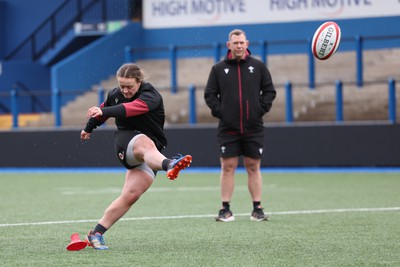 220324 - Wales Women Captain’s Walkthrough - Lleucu George is watched by Ioan Cunningham, Wales Women head coach, during Captain’s Walkthrough ahead of their opening Women’s 6 Nations match against Scotland