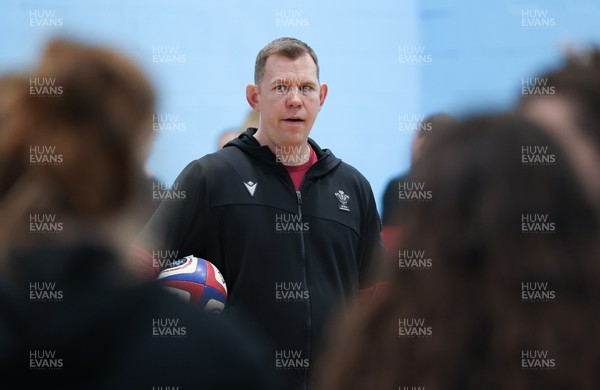 290324 - Wales Women Rugby Walkthrough  - Ioan Cunningham, Wales Women head coach, during Captain’s Walkthrough ahead of the Guinness Women’s 6 Nations match against England The session took place indoors due to torrential rain