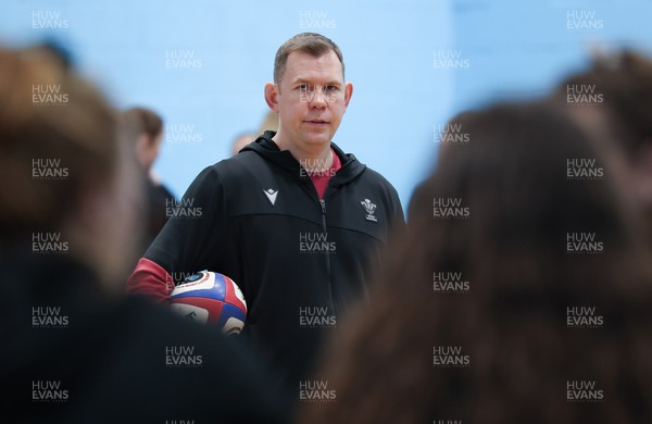 290324 - Wales Women Rugby Walkthrough  - Ioan Cunningham, Wales Women head coach, during Captain’s Walkthrough ahead of the Guinness Women’s 6 Nations match against England The session took place indoors due to torrential rain