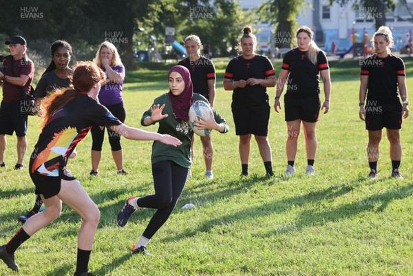 250822 - Wales Women Rugby Community Engagement in Canada - Wales’ Alisha Butchers, Carys Phillips, Gwen Crabb, and Kerin Lake watch Halifax RFC Junior Girls during a training session in Halifax, Canada