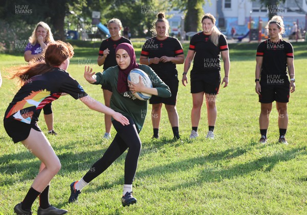 250822 - Wales Women Rugby Community Engagement in Canada - Wales’ Alisha Butchers, Carys Phillips, Gwen Crabb, and Kerin Lake watch Halifax RFC Junior Girls during a training session in Halifax, Canada