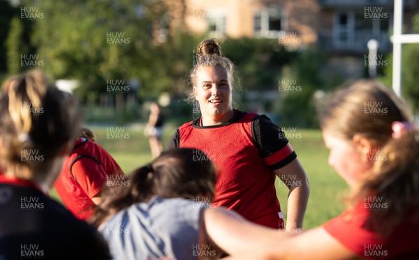250822 - Wales Women Rugby Community Engagement in Canada - Wales’ Carys Phillips working with Halifax RFC Junior Girls during a training session in Halifax, Canada NB - Pic taken by Wales player Gwen Crabb