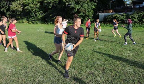 250822 - Wales Women Rugby Community Engagement in Canada - Wales’ Carys Phillips working with Halifax RFC Junior Girls during a training session in Halifax, Canada 