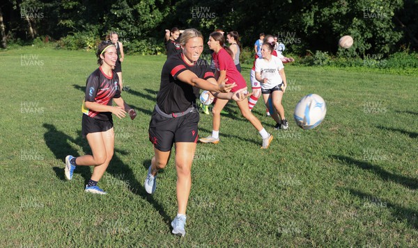 250822 - Wales Women Rugby Community Engagement in Canada - Wales’ Alisha Butchers working with Halifax RFC Junior Girls during a training session in Halifax, Canada 