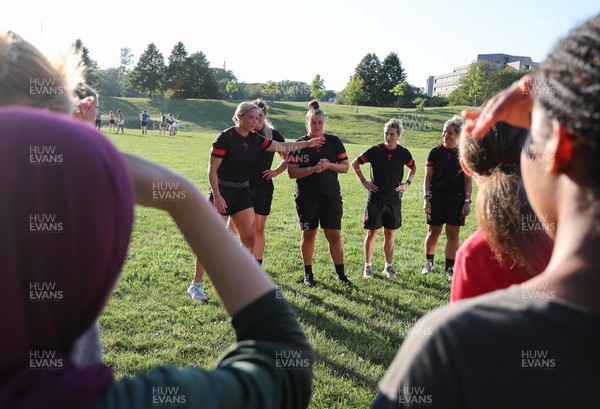 250822 - Wales Women Rugby Community Engagement in Canada - Wales’ Alisha Butchers, Gwen Crabb, Carys Phillips, Keira Bevan and Kerin Lake working with Halifax RFC Junior Girls during a training session in Halifax, Canada