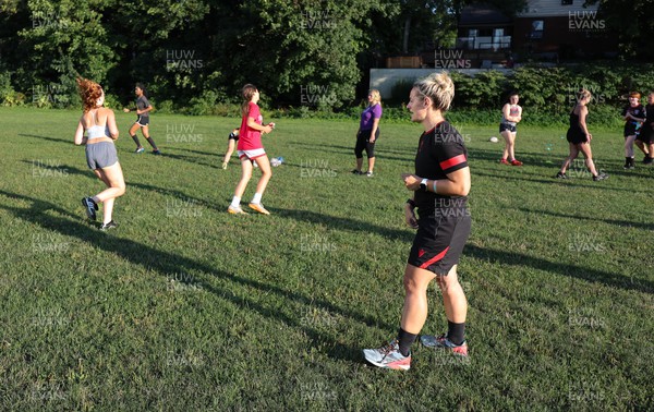 250822 - Wales Women Rugby Community Engagement in Canada - Wales’ Kerin Lake working with Halifax RFC Junior Girls during a training session in Halifax, Canada