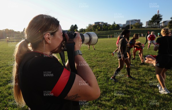 250822 - Wales Women Rugby Community Engagement in Canada - Wales’ Gwen Crabb turns photographer while at Halifax RFC Junior Girls during a training session in Halifax, Canada