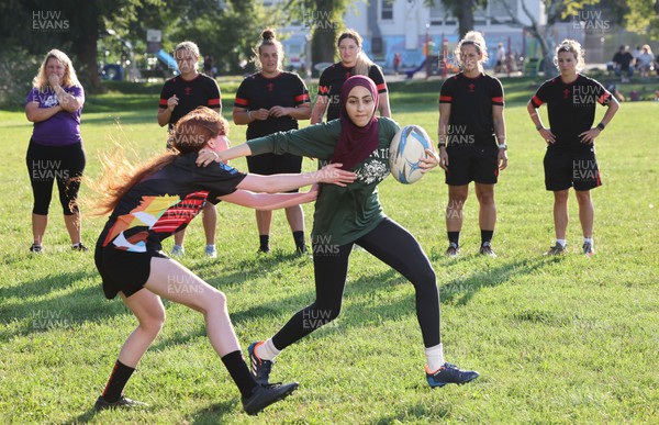 250822 - Wales Women Rugby Community Engagement in Canada - Wales’ Alisha Butchers, Carys Phillips, Gwen Crabb, Kerin Lake and Keira Bevan watch Halifax RFC Junior Girls during a training session in Halifax, Canada