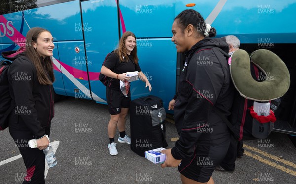 101023 - Wales Women Rugby team depart for WXV1 - Wales Women’s squad members, Nel Metcalfe, Kate Williams and Sisilia Tuipulotu are all smiles as they depart the National Centre of Excellence at the Vale as they depart for WXV1 in New Zealand