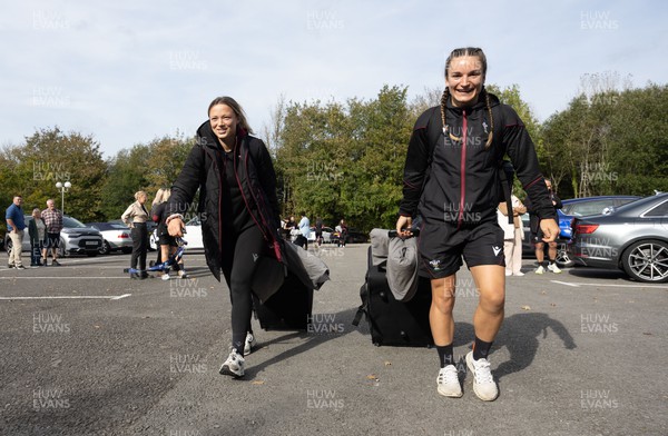 101023 - Wales Women Rugby team depart for WXV1 - Alisha Butchers and Jasmine Joyce make their way to the coach as they prepare to depart the National Centre of Excellence at the Vale for WXV1 in New Zealand