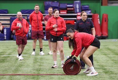 040526 - Wales Women Rugby with South Wales Fire Service - Wales International Squad member and South Wales Fire Service fire fighter Jenni Scoble brings her colleagues from Blue Watch Roath to meet and take part in team building with her Wales team members Jenni Scoble works with Jorja Aiono during a team challenge