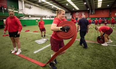 040526 - Wales Women Rugby with South Wales Fire Service - Wales International Squad member and South Wales Fire Service fire fighter Jenni Scoble brings her colleagues from Blue Watch Roath to meet and take part in team building with her Wales team members Bethan Lewis takes part in the team exercise