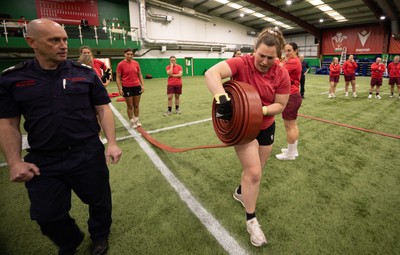 040526 - Wales Women Rugby with South Wales Fire Service - Wales International Squad member and South Wales Fire Service fire fighter Jenni Scoble brings her colleagues from Blue Watch Roath to meet and take part in team building with her Wales team members Gwenllian Pyrs takes part in the team exercise