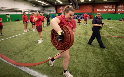 040526 - Wales Women Rugby with South Wales Fire Service - Wales International Squad member and South Wales Fire Service fire fighter Jenni Scoble brings her colleagues from Blue Watch Roath to meet and take part in team building with her Wales team members Gwenllian Pyrs takes part in the team exercise