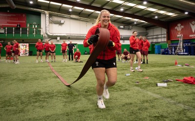 040526 - Wales Women Rugby with South Wales Fire Service - Wales International Squad member and South Wales Fire Service fire fighter Jenni Scoble brings her colleagues from Blue Watch Roath to meet and take part in team building with her Wales team members Kelsey Jones takes part in the team exercise