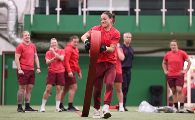 040526 - Wales Women Rugby with South Wales Fire Service - Wales International Squad member and South Wales Fire Service fire fighter Jenni Scoble brings her colleagues from Blue Watch Roath to meet and take part in team building with her Wales team members Jasmine Joyce during a team challenge