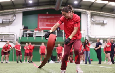 040526 - Wales Women Rugby with South Wales Fire Service - Wales International Squad member and South Wales Fire Service fire fighter Jenni Scoble brings her colleagues from Blue Watch Roath to meet and take part in team building with her Wales team members Jasmine Joyce during a team challenge