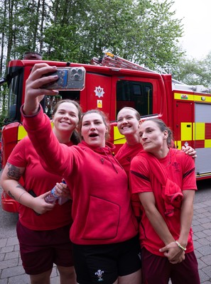 040526 - Wales Women Rugby with South Wales Fire Service - Wales International Squad member and South Wales Fire Service fire fighter Jenni Scoble brings her colleagues from Blue Watch Roath to meet and take part in team building with her Wales team members Maisie Davies, Gwenllian Pyrs, Carys Cox and Jasmine Joyce with the fire engine