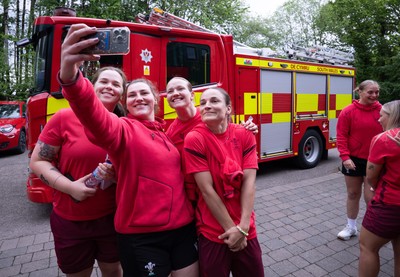 040526 - Wales Women Rugby with South Wales Fire Service - Wales International Squad member and South Wales Fire Service fire fighter Jenni Scoble brings her colleagues from Blue Watch Roath to meet and take part in team building with her Wales team members Maisie Davies, Gwenllian Pyrs, Carys Cox and Jasmine Joyce with the fire engine