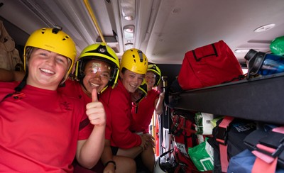 040526 - Wales Women Rugby with South Wales Fire Service - Wales International Squad member and South Wales Fire Service fire fighter Jenni Scoble brings her colleagues from Blue Watch Roath to meet and take part in team building with her Wales team members Molly Reardon, Jenna De Vera, Alisha Joyce, Tilly Vucaj and Carys Cox in the fire engine