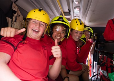 040526 - Wales Women Rugby with South Wales Fire Service - Wales International Squad member and South Wales Fire Service fire fighter Jenni Scoble brings her colleagues from Blue Watch Roath to meet and take part in team building with her Wales team members Molly Reardon, Jenna De Vera, Alisha Joyce, Tilly Vucaj and Carys Cox in the fire engine