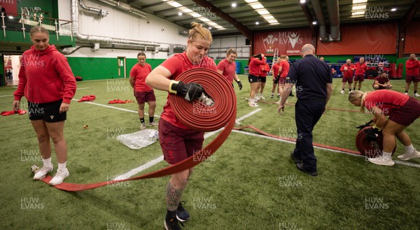 040526 - Wales Women Rugby with South Wales Fire Service - Wales International Squad member and South Wales Fire Service fire fighter Jenni Scoble brings her colleagues from Blue Watch Roath to meet and take part in team building with her Wales team members Bethan Lewis takes part in the team exercise