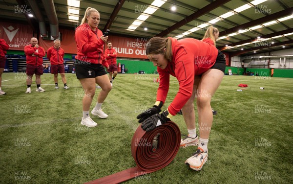 040526 - Wales Women Rugby with South Wales Fire Service - Wales International Squad member and South Wales Fire Service fire fighter Jenni Scoble brings her colleagues from Blue Watch Roath to meet and take part in team building with her Wales team members Gwen Crabb takes part in the team exercise