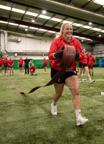 040526 - Wales Women Rugby with South Wales Fire Service - Wales International Squad member and South Wales Fire Service fire fighter Jenni Scoble brings her colleagues from Blue Watch Roath to meet and take part in team building with her Wales team members Kelsey Jones takes part in the team exercise
