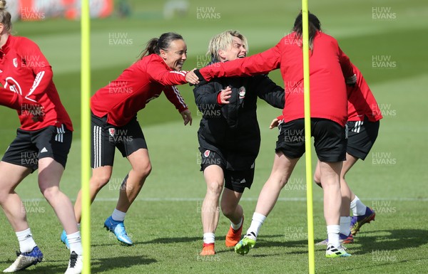 060421 Wales Women Football Training Session - Wales Women squad members warm up during training session ahead of their match against Canada