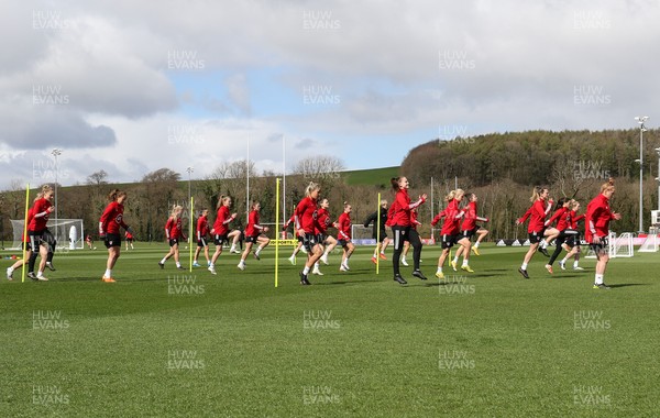060421 Wales Women Football Training Session - Wales Women squad players warm up at the start of their training session ahead of their match against Canada