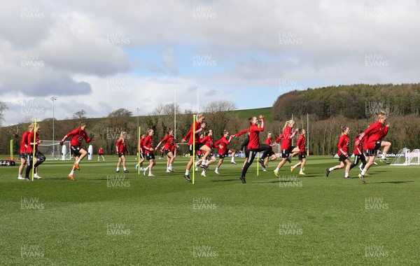 060421 Wales Women Football Training Session - Wales Women squad players warm up at the start of their training session ahead of their match against Canada