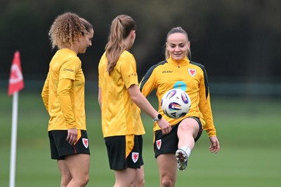 061026 - Wales Women Football Training - Carrie Jones, Lois Joel and Lilly Woodham during training ahead of their World Cup Play-Off match against Albania