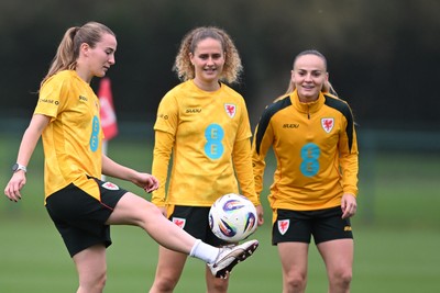 061026 - Wales Women Football Training - Carrie Jones, Lois Joel and Lilly Woodham during training ahead of their World Cup Play-Off match against Albania