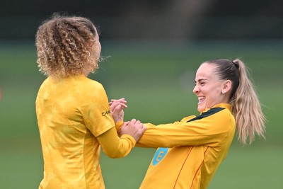 061026 - Wales Women Football Training - Lois Joel and Lilly Woodham during training ahead of their World Cup Play-Off match against Albania