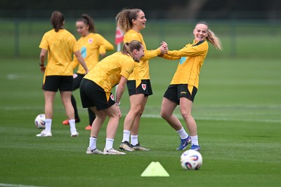 061026 - Wales Women Football Training - Lois Joel and Lilly Woodham during training ahead of their World Cup Play-Off match against Albania
