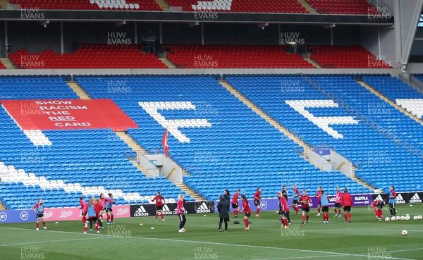 120421 Wales Women Football Training Session - The Wales Women football squad warm up during a training session at Cardiff City Stadium ahead of their friendly international match against Denmark