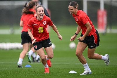 121026 - Wales Women Football Training - Lilly Woodham and Gemma Evans during training head of their sides World Cup play-off match against Albania
