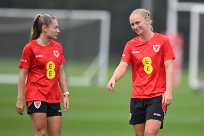 121026 - Wales Women Football Training - Charlie Estcourt and Elise Hughes during training head of their sides World Cup play-off match against Albania