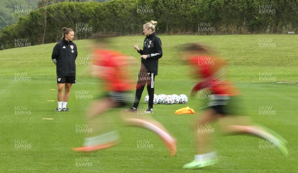 140921 - Wales Women Football Training Session - Wales manager Gemma Grainger, right, with coach Loren Dykes during a training session ahead of their opening 2023 FIFA Women’s World Cup Qualifying Round matches against Kazakhstan and Estonia