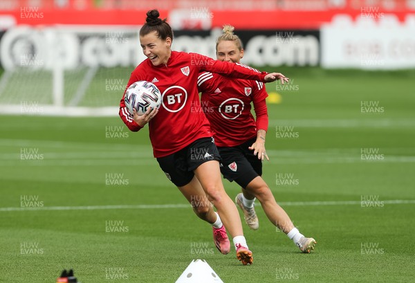 140921 - Wales Women Football Training Session - Angharad James of Wales gives Jess Fishlock the run around during a training session ahead of their opening 2023 FIFA Women’s World Cup Qualifying Round matches against Kazakhstan and Estonia