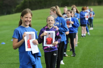 160921 - Wales Women Football Training Session - Pupils from Dolau Primary School, Llanharan, wait to make a surprise welcome for the members of the Wales Womens Football team, and pass on letters they have written to them, ahead of the team's opening 2023 FIFA Women’s World Cup Qualifying Round matches against Kazakhstan and Estonia