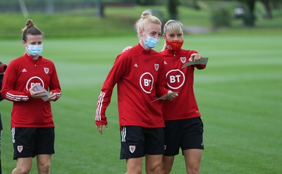 160921 - Wales Women Football Training Session - Pupils from Dolau Primary School, Llanharan, wait to make a surprise welcome for the members of the Wales Womens Football team, and pass on letters they have written to them, ahead of the team's opening 2023 FIFA Women’s World Cup Qualifying Round matches against Kazakhstan and Estonia