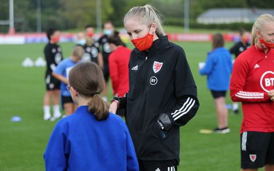 160921 - Wales Women Football Training Session - Pupils from Dolau Primary School, Llanharan, wait to make a surprise welcome for the members of the Wales Womens Football team, and pass on letters they have written to them, ahead of the team's opening 2023 FIFA Women’s World Cup Qualifying Round matches against Kazakhstan and Estonia