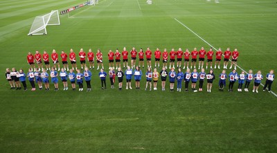 160921 - Wales Women Football Training Session - Pupils from Dolau Primary School, Llanharan, wait to make a surprise welcome for the members of the Wales Womens Football team, and pass on letters they have written to them, ahead of the team's opening 2023 FIFA Women’s World Cup Qualifying Round matches against Kazakhstan and Estonia