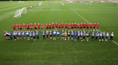 160921 - Wales Women Football Training Session - Pupils from Dolau Primary School, Llanharan, with members of the Wales Womens Football team, after the pupils met the players to show their support and pass on letters they have written to them, ahead of the team's opening 2023 FIFA Women’s World Cup Qualifying Round matches against Kazakhstan and Estonia