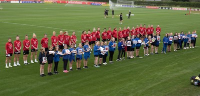 160921 - Wales Women Football Training Session - Pupils from Dolau Primary School, Llanharan, with members of the Wales Womens Football team, after the pupils met the players to show their support and pass on letters they have written to them, ahead of the team's opening 2023 FIFA Women’s World Cup Qualifying Round matches against Kazakhstan and Estonia