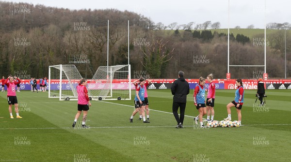 170221 - Wales Women Football Training Session - Interim assistant coach Matty Jones takes a group through a skills session during Wales Women's Football squad training