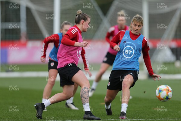 170221 - Wales Women Football Training Session - Kylie Nolan and Gemma Evans compete for the ball during a Wales Women training session