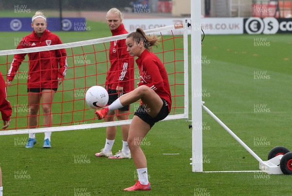 191021 - Wales Women Football Training - Hannah Cain warms up during a training session ahead of their World Cup Qualifying matches against Slovenia and Estonia