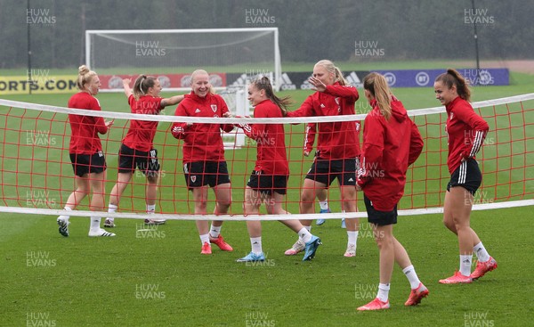 191021 - Wales Women Football Training - Wales Women squad members warm up during a training session ahead of their World Cup Qualifying matches against Slovenia and Estonia